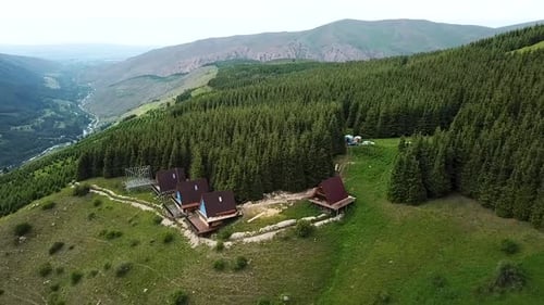 Aerial view of chalet cottages in mountain resort