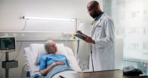 Doctor, consultation and tablet with senior patient for medical diagnosis or procedure in hospital