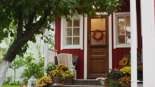 Charming Home Exterior Decorated for Autumn