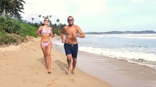 Happy, Young Couple Running on Tropical Beach, Super 240