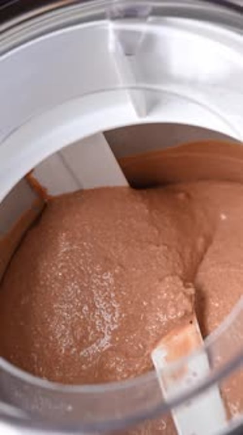 Chocolate Gelato Moving In An Ice Cream Maker