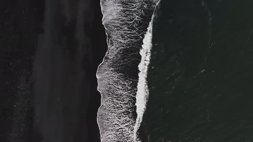 The Black Sand Beach in Iceland Sea Aerial View and Top View