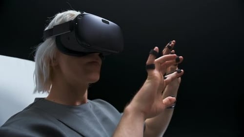 Cyberpunk Man Hands Enjoying VR Modern Interactive Chair Closeup. Active Guy Using