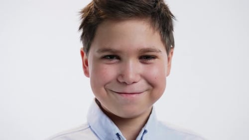 Smiling Boy Close Up Portrait on White Background