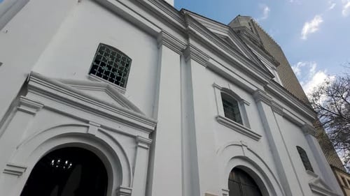Upward Panning View Of Basilica Of Our Lady Of Candelaria Building In Medellin, Colombia