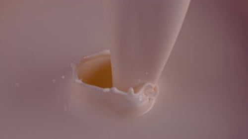 Milk yogurt splash slowmotion swirl appetiteappeal creamy pour dynamic liquid motion foodstyling