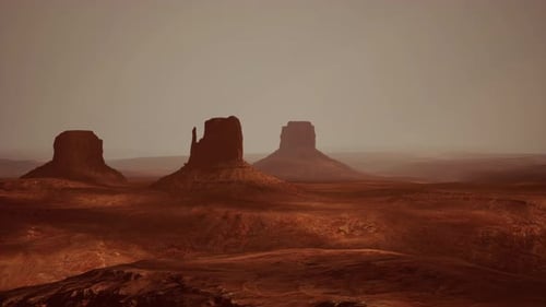 A Stunning Aerial View of a Desert Landscape with Majestic Mountains