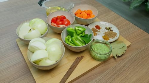 Cooking Video. Close up of food preparation chopping of ingredients and showing different items in a