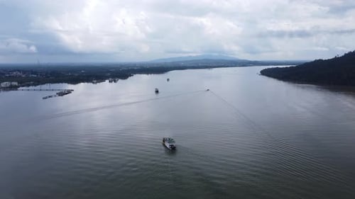 Ferries carry passengers sailing on the Kalimantan sea