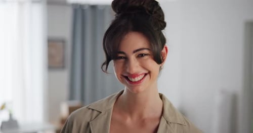 Woman, face and smile in new home for moving, boxes and excited for property investment in lounge