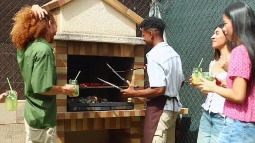 Friends Gather Around Barbecue Grill on Sunny Day