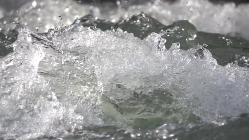 Cold ice water from raging river, Close up, Slow motion