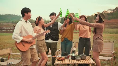 Group of young Asian people are enjoy camping in natural campsite