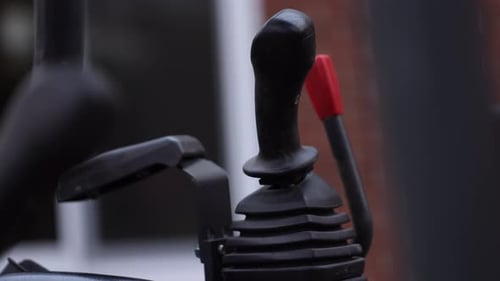 Small construction Excavator controls - heavy equipment - close up