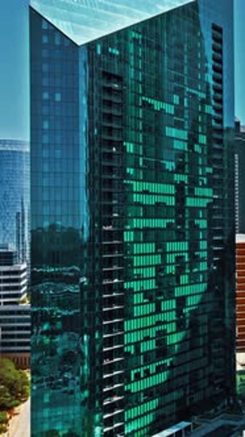 Modern skyscraper reflecting sunlight in Dallas, Texas