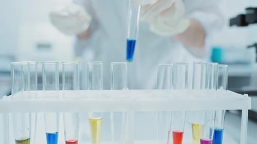 Scientist Preparing Colorful Test Tubes in the Lab