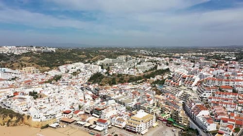 Aerial footage of the beautiful beach front of Albufeira in Portugal,