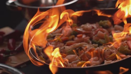Sizzling Shrimp and Vegetable Stir-Fry with Flames