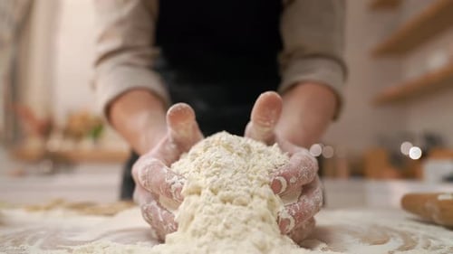 Close Up Hands Kneading White Flour