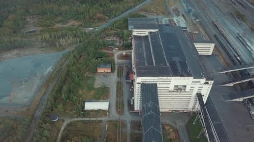 Industrial Building with Conveyor Belts at Mining Site