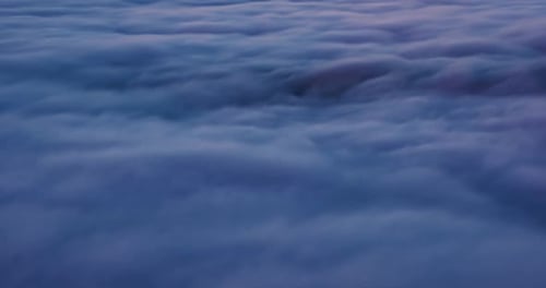 Ocean of Clouds Moving after Sunset in Peaceful Nature Heaven Background