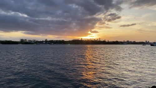Beautiful Orange Sunset, River City Brisbane. Wonderful Combination Of City Buildings and Water.