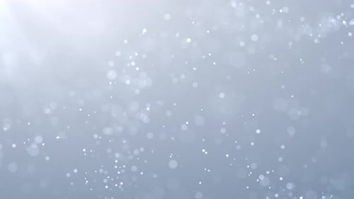 Weißer Schneehintergrund mit wirbelnden leuchtenden Partikeln. Weiche, graue Weihnachts-Bildschirmschleife mit ruhigem Peitschen