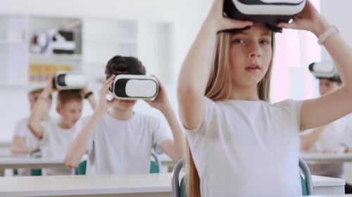 Teen Students Experiencing Virtual Reality in Classroom Setting