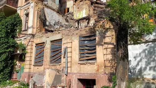 Completely destroyed and demolished civilian building by a big rocket in Kyiv Ukraine, critical war