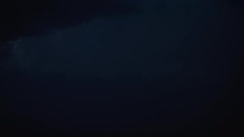 Dramatic Stormy Sky with Lightning Strikes at Night