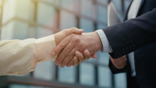 Business Partnership Handshake Meeting in City Man Woman Deal Outdoors Cooperation Negotiation Unity