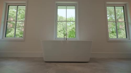 Elements of Modern Tiled Bathroom with Shower in Modern Home Real Estate Interior