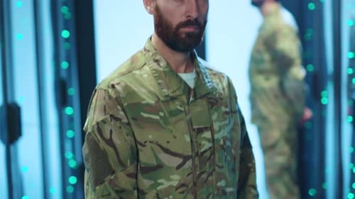 Man in Military Uniform Standing in Server Room
