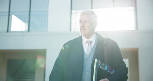 Mature man, professor or walk at campus for lecture, education or shared knowledge