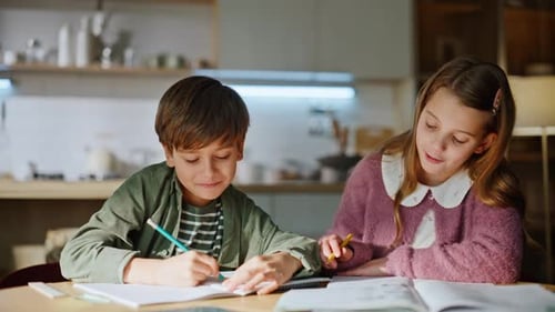 Smart School Children Discussing Homework Writing Notebooks Workspace Closeup