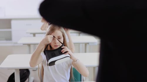 Students Using Virtual Reality Headsets in a Classroom