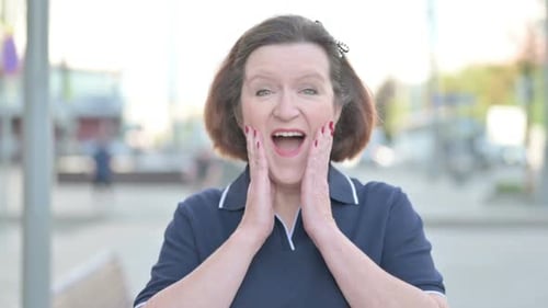 Woman Reacts with Excited Joy to Good News