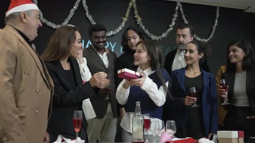 Colleagues Celebrate with Gifts and Cheer