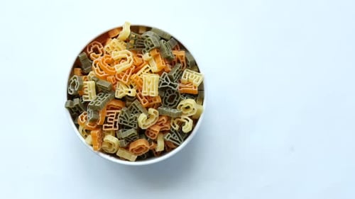 Colorful Alphabet Pasta in White Bowl