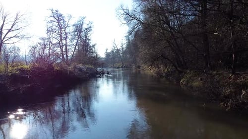 Serene River Scene with Reflections