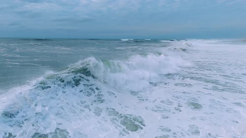 Ocean Wave Rolling Across the Turbulent Sea