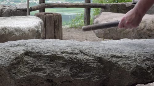 Sound is produced by lightly hitting a stone