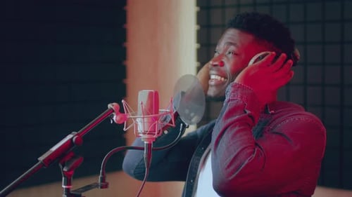 Professional Singer Performs Passionately in Modern Recording Studio