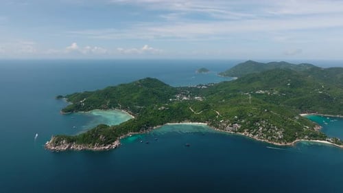 Island Coastline with Rocky Outcrops and Clear Water Koh Tao Thailand