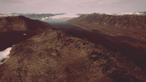 Beautiful Landscape with Cold Sea and Snowy Mountains