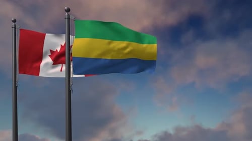 Canada and Gabon National Flags Waving on Flagpoles
