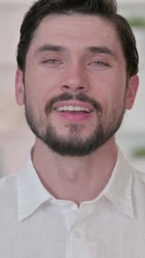 Man saying Yes by Shaking Head, vertical video
