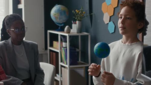 Children and Teacher Learning About Solar System in Classroom