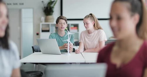 High school students studying renewable energy