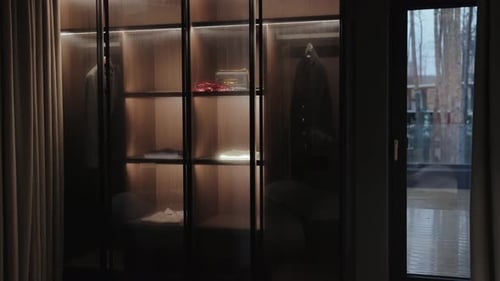 Modern Lit Wardrobe in a Luxurious Master Bedroom
